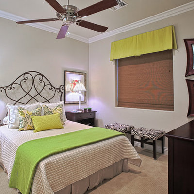 Example of a trendy carpeted bedroom design in Nashville with beige walls