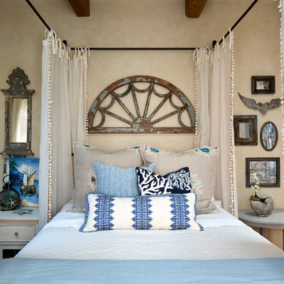 Mid-sized beach style master bedroom photo in San Francisco with beige walls