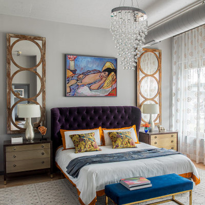 Bedroom - mid-sized eclectic master medium tone wood floor and beige floor bedroom idea in Boston with no fireplace and gray walls