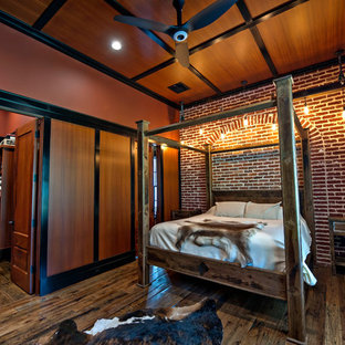 Bedroom - craftsman master dark wood floor bedroom idea in Atlanta with brown walls