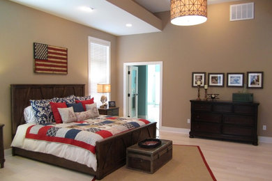 Large elegant guest light wood floor and brown floor bedroom photo in San Diego with brown walls and no fireplace