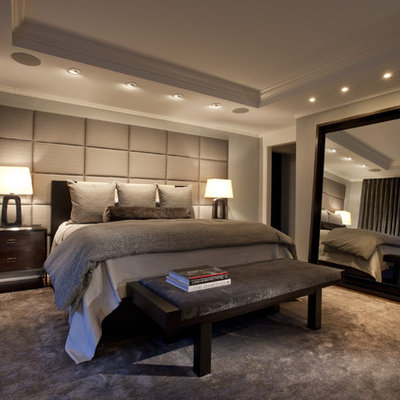Example of a classic master dark wood floor bedroom design in Chicago with gray walls