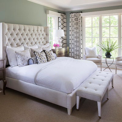 Example of a large transitional master carpeted bedroom design in Minneapolis with green walls and no fireplace