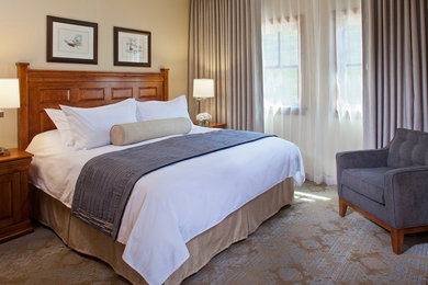 Design ideas for a guest bedroom in Denver with carpet.