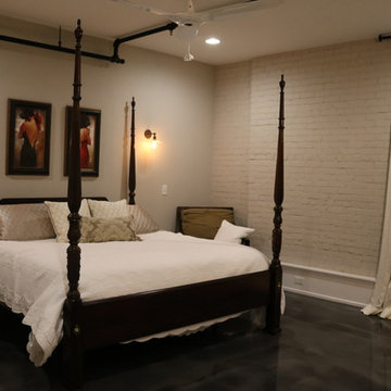 Loft Bedrooms - painted brick accent wall