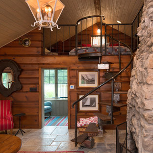 Foto de dormitorio tipo loft, rural, pequeño, con paredes marrones