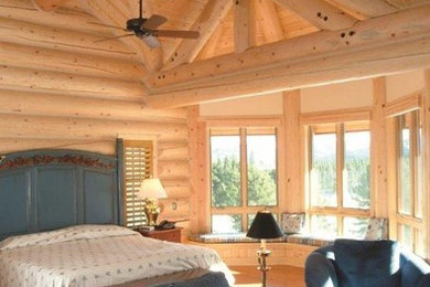Inspiration for a large rustic guest bedroom in Boise with no fireplace.