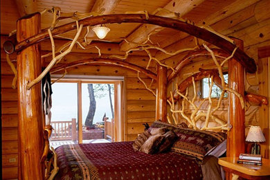 Mountain style master bedroom photo in Other