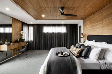 This is an example of a scandinavian grey and brown bedroom in Other with brown walls, carpet and grey floors.