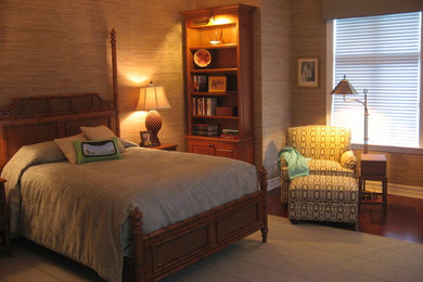 Example of a mid-sized transitional master medium tone wood floor bedroom design in Miami