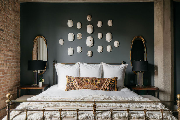 Industrial Bedroom by Amber Golob Interiors