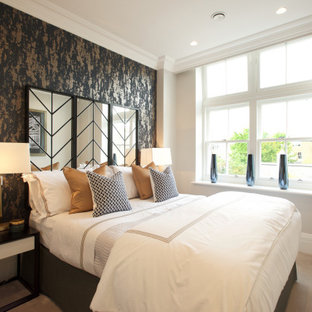 Inspiration for a traditional guest bedroom in Other with beige walls, carpet, no fireplace, beige floors and wallpapered walls.
