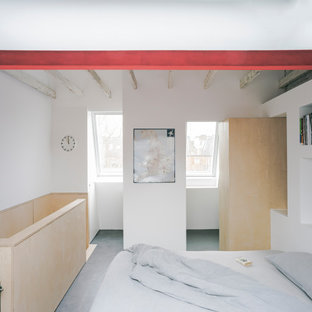 Inspiration for a medium sized contemporary master bedroom in London with white walls, vinyl flooring, grey floors and exposed beams.