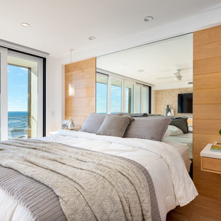 Inspiration for a huge contemporary master bedroom remodel in Los Angeles with white walls