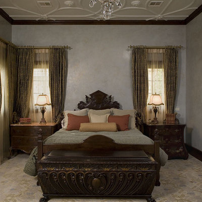 Inspiration for a timeless bedroom remodel in Austin with beige walls