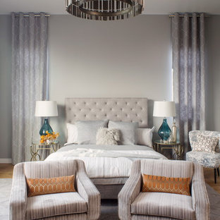 Trendy bedroom photo in Other with gray walls