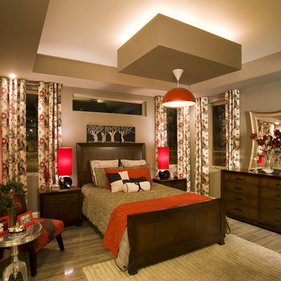 Inspiration for a contemporary master light wood floor and beige floor bedroom remodel in Austin with beige walls and no fireplace