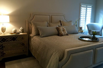 Beach style master dark wood floor bedroom photo in Orlando with white walls and no fireplace