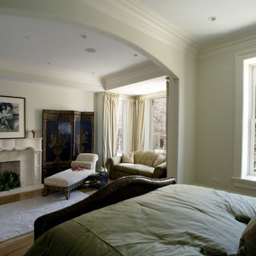 Master Bedroom Arched Doorway Leads to Adjacent Sitting Room