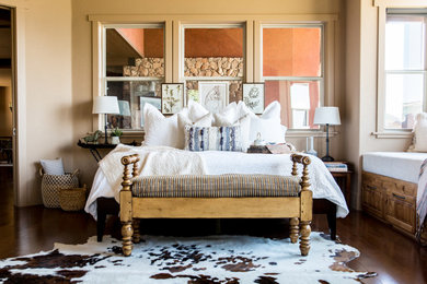 Cottage dark wood floor and brown floor bedroom photo in Richmond with beige walls