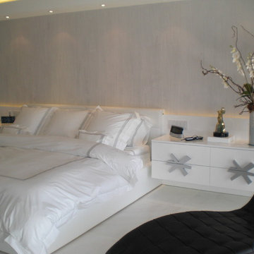 master bedroom in white and silver