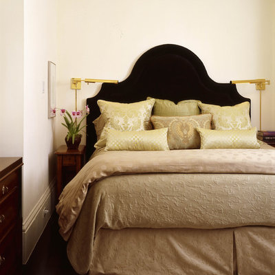Inspiration for an eclectic bedroom remodel in Other with beige walls