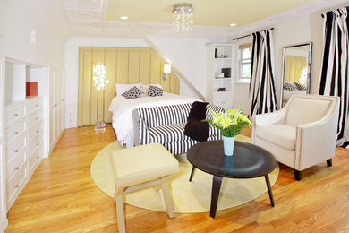 Bedroom - mid-sized contemporary master medium tone wood floor bedroom idea in Boston with white walls and no fireplace