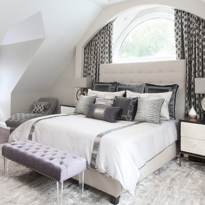 Bedroom - transitional dark wood floor and brown floor bedroom idea in Boston with beige walls