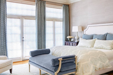 Example of a transitional bedroom design in Raleigh