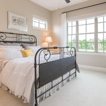 Master bedroom receives lots of sunlight from three single-hung windows