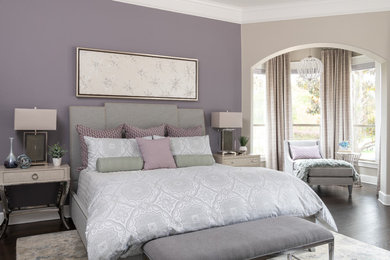 Large minimalist master dark wood floor and brown floor bedroom photo in Dallas with purple walls
