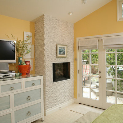 Inspiration for a contemporary bedroom remodel in Los Angeles with yellow walls