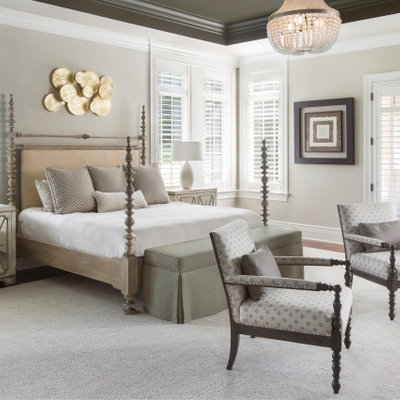Example of a transitional bedroom design in St Louis
