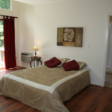 Master bedroom staged in a vacant home