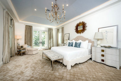 Example of a mid-sized classic master carpeted and beige floor bedroom design in Tampa with white walls and no fireplace