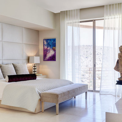 Trendy master bedroom photo in Phoenix with a corner fireplace