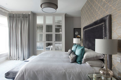 Master bedroom with bespoke wardrobe, headboard, ottomans, curtains and furnitur