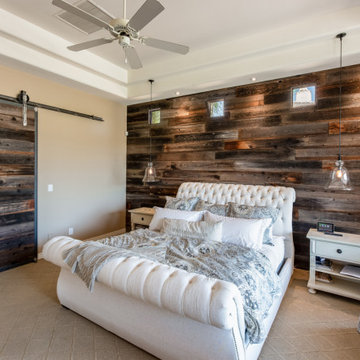 Master Bedroom with Custom Barnwood Wall and Media Center with Fireplace