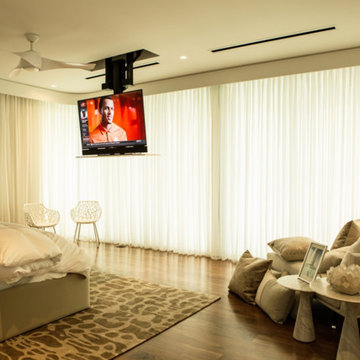 Master Bedroom with Custom TV Lift and Motorized Shades