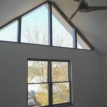 Master bedroom with gable windows