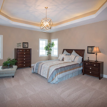 Master bedroom with specialty ceiling
