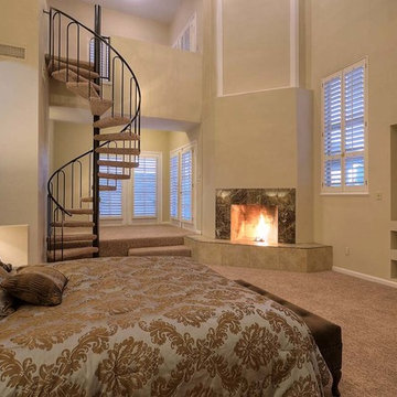 Master Bedroom with spiral staircase to loft