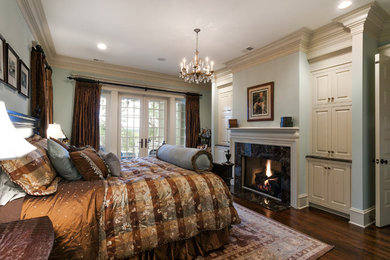 Inspiration for a timeless master dark wood floor bedroom remodel in Charleston with white walls