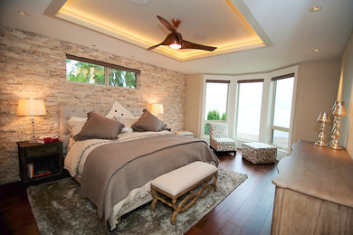 Example of a mid-sized transitional master dark wood floor bedroom design in Vancouver with beige walls and no fireplace