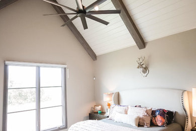 Bedroom - large transitional master medium tone wood floor and gray floor bedroom idea in Oklahoma City with gray walls