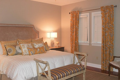 Example of a mid-sized transitional master bedroom design in Other with beige walls
