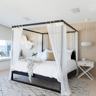 Design ideas for an expansive contemporary master bedroom in Gold Coast - Tweed with carpet, beige floor and beige walls.