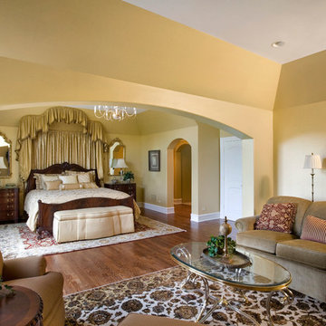 Master Suite Featuring Arched Openings from Sitting Room to Bedroom and Bath