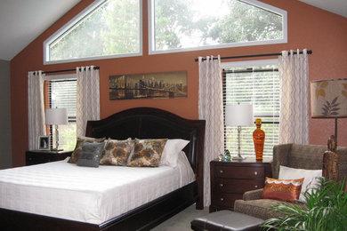 Inspiration for a large contemporary master bedroom in Sacramento with green walls, carpet and no fireplace.