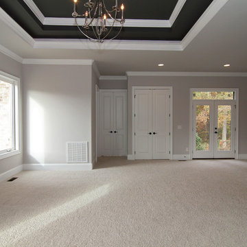 Master suite with French doors to backyard
